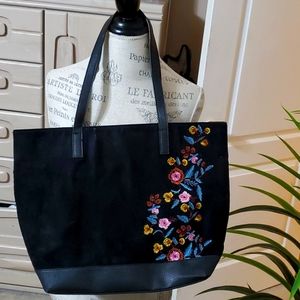 Like sude and like leather very large black bag with flowers on it. $31 Now $27.
